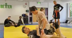 BJJ ground scramble and pin escape training at Kinetic Zen